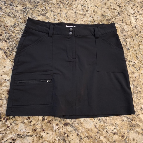 World Wide Sportsman Pants - Black skort with zippered pockets.
